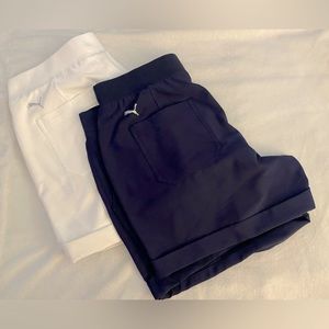 Selling as a pair. Puma golf shorts. Navy & White